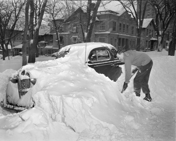 Car snowed under